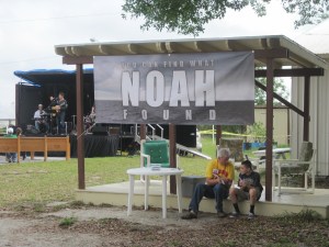 Paul sharing the gospel with a young man who prayed to receive Christ at the mission's Salsa Festival on March 29.