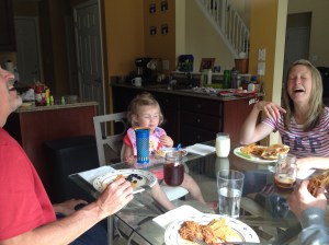 Our three year old great niece cracks up her mom and Uncle Paul.