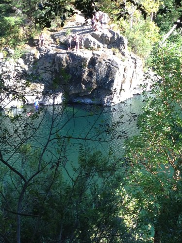 Peeking through the branches as we carefully descend below to Smith River.